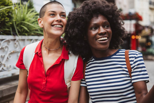 istock Young lesbian couple traveling 2157186124
