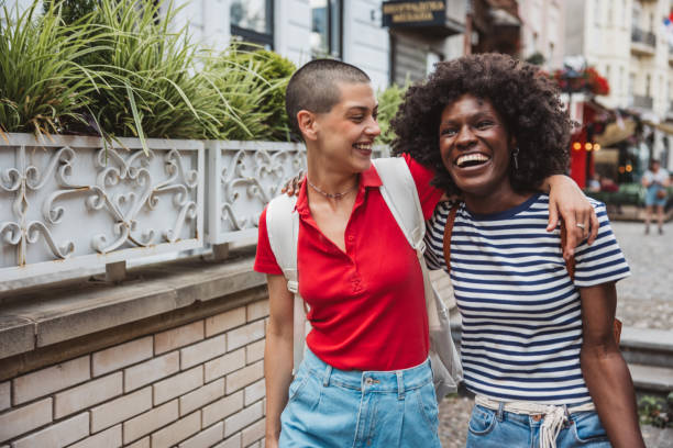 istock Young lesbian couple traveling 2157186131