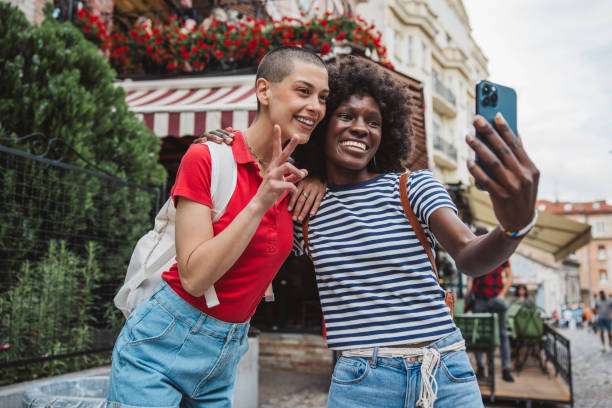 istock Young lesbian couple traveling 2157186141