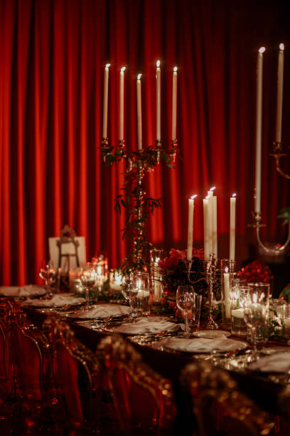 istock Beautiful table setting for family Christmas dinner at home. Cozy atmosphere, candlelight. 2157187764
