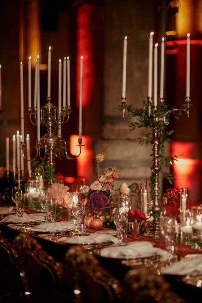 istock Beautiful table setting for family Christmas dinner at home. Cozy atmosphere, candlelight. 2157187807