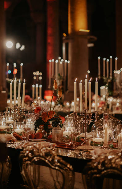istock Beautiful table setting for family Christmas dinner at home. Cozy atmosphere, candlelight. 2157187864