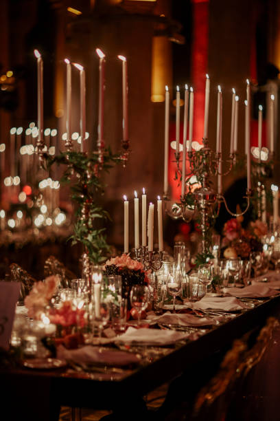 istock Beautiful table setting for family Christmas dinner at home. Cozy atmosphere, candlelight. 2157187870
