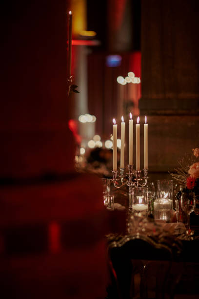 istock Beautiful table setting for family Christmas dinner at home. Cozy atmosphere, candlelight. 2157187875