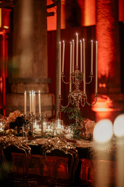 istock Beautiful table setting for family Christmas dinner at home. Cozy atmosphere, candlelight. 2157187896