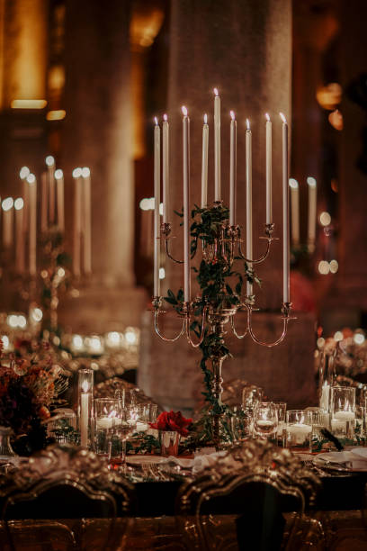 istock Beautiful table setting for family Christmas dinner at home. Cozy atmosphere, candlelight. 2157187929