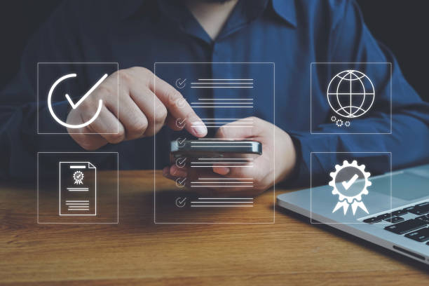 istock Quality ISO, ISO standards quality control, assurance and warranty business technology concept. Businessman using laptop computer with quality assurance and document icon for ISO, Standardization. 2157191379