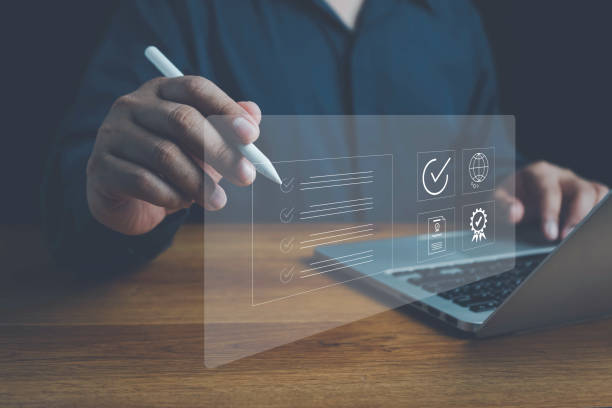 istock Quality ISO, ISO standards quality control, assurance and warranty business technology concept. Businessman using laptop computer with quality assurance and document icon for ISO, Standardization. 2157191385