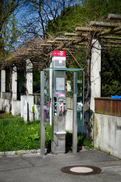 A photo of an old payphone taken at one of the train stations in Hong Kong.