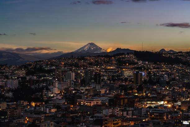 istock a cityscape at dusk with mountains in the background 2157193970