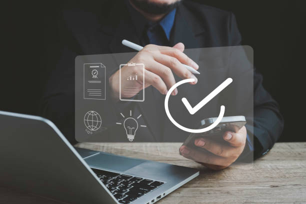 istock Quality ISO, ISO standards quality control, assurance and warranty business technology concept. Businessman using laptop computer with quality assurance and document icon for ISO, Standardization. 2157194525