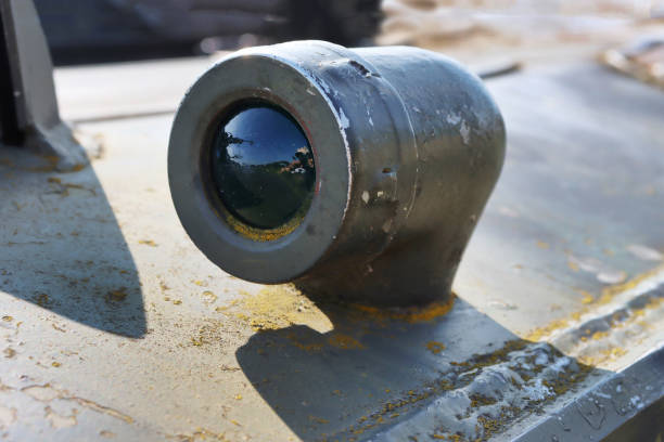 Barrel with a tank close-up. A close up shot of a rusty military tank gun, tank canon. The barrel of the Soviet anti-tank rifle. Artillery gun close-up. Shallow depth of field