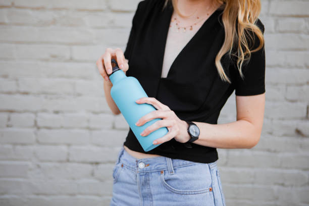 istock Woman carrying a thermal bottle 2157196084