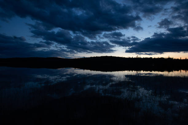 Night sky over a lake in northern Ontario.