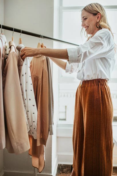 istock Young female designer in a boutique 2157201122