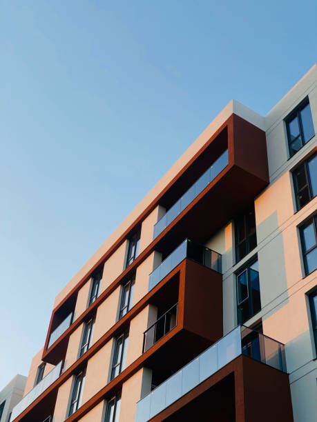 istock Modern Apartment Building Against Blue Sky 2157202034