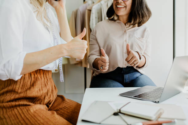 istock Young female designer in a boutique 2157206218