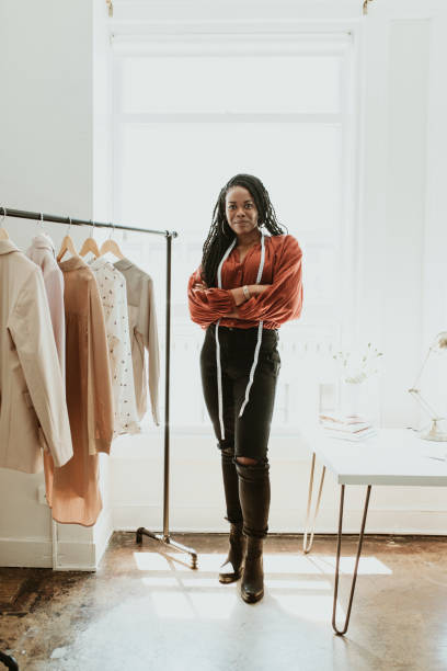 istock Young female designer in a boutique 2157206237
