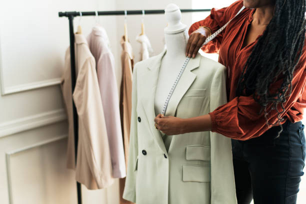 istock Young female designer in a boutique 2157206283