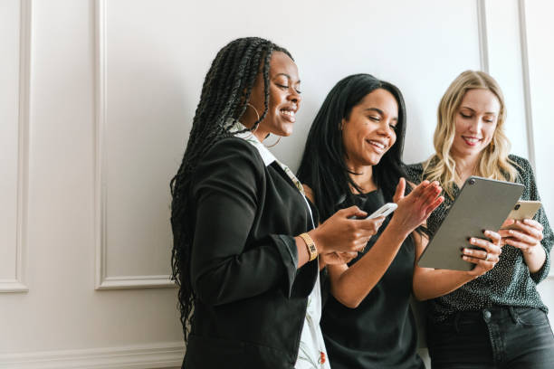 istock Happy diverse businesswoman using a digital tablet 2157206399