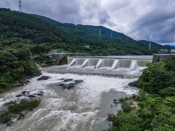 istock Waterfalls and river formed by the lake overflowing the dam 2157207492