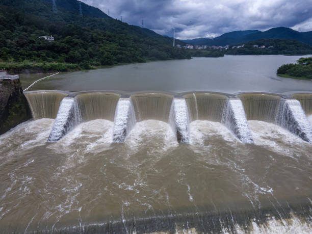 istock Waterfalls and river formed by the lake overflowing the dam 2157207513