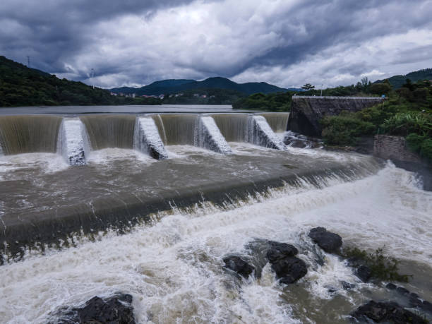 istock Waterfalls and river formed by the lake overflowing the dam 2157207526