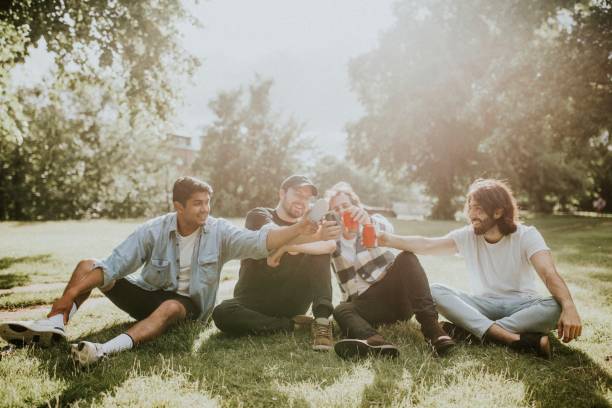 Friends hangout drinking beer stock image