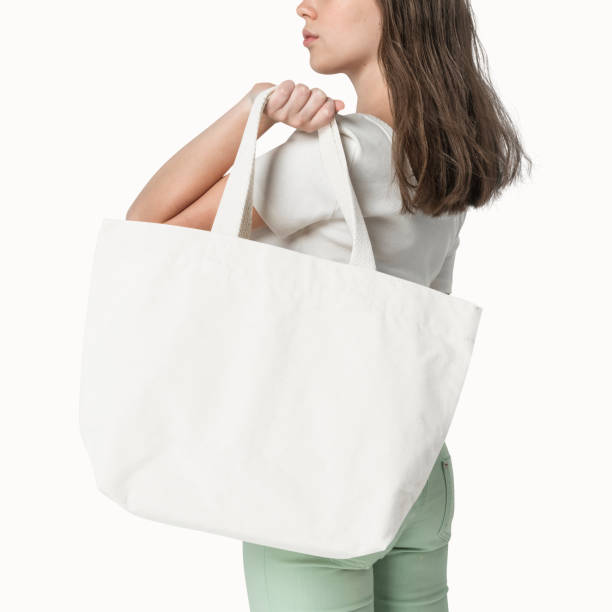 istock Woman with white tote bag 2157208025