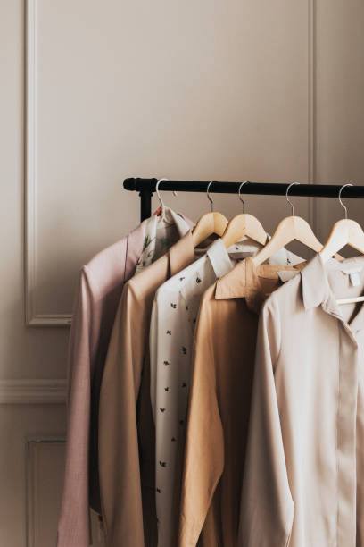 istock Clothes on a hanger in a boutique 2157212165
