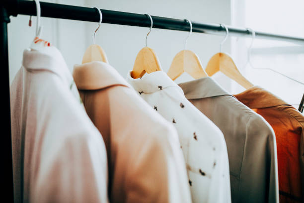 istock Clothes on a hanger in a boutique 2157212440