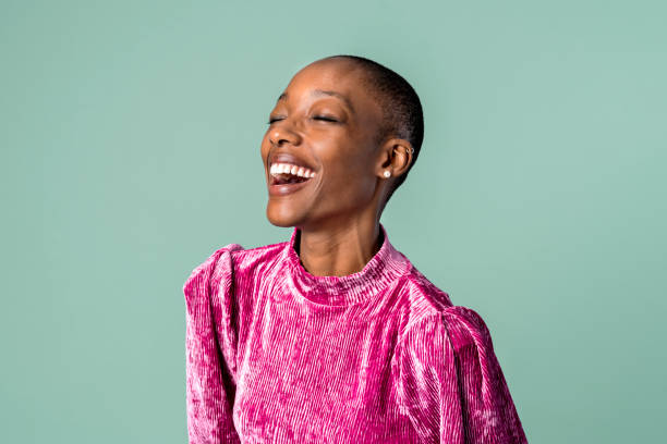 istock Happy woman in a pink top 2157216271