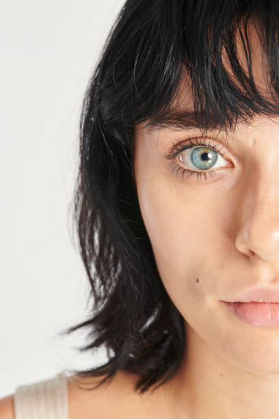 istock Half face beautiful woman with blue eyes 2157217915