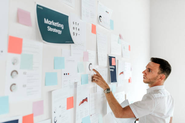 istock A casual business man checking a marketing plan 2157218391