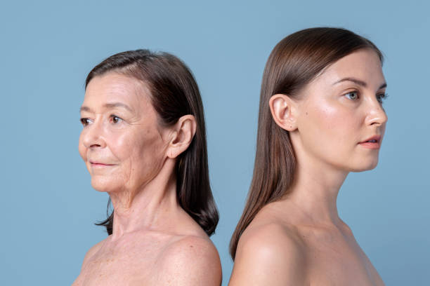 istock Two women standing back to back 2157219003