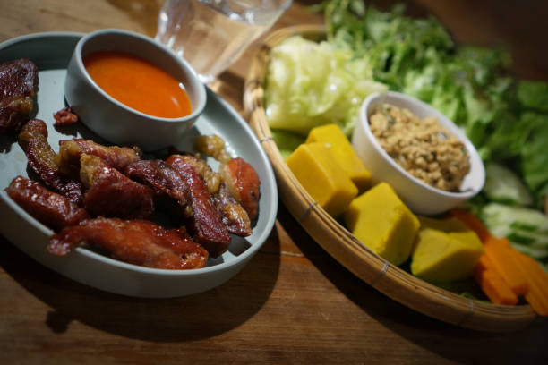 istock Smoked Grilled Pork with Fresh Vegetables and Macadamia Chili Dip, Selective Focused 2157221157