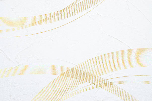 Golden curves, background is a moving white painted wall (abstract)