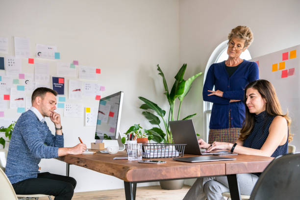 istock Diverse business people in a meeting 2157230441