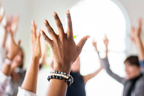 istock Team making hands raised in the air 2157230534