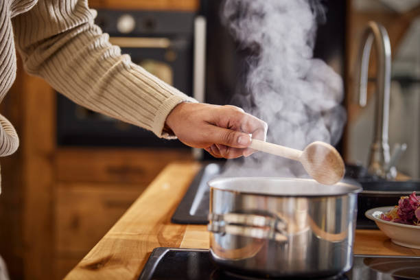 istock Close up of a black bachelor cooking lunch. 2157230956