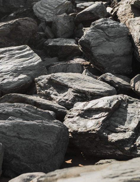 istock Craggy stones stacked together under the sun 2157233039