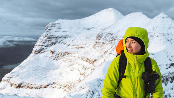 istock Mountaineer climbing Liathach Ridge, Scotland 2157233483