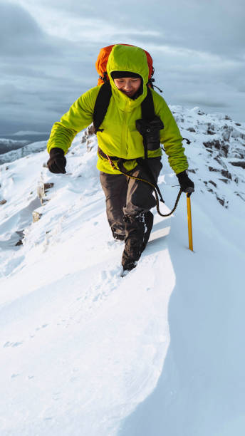 istock Mountaineer climbing Liathach Ridge, Scotland 2157233485