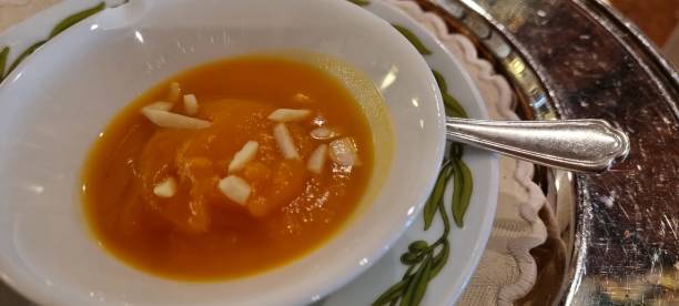 istock Homemade pumpkin soup with almond slivers 2157235542
