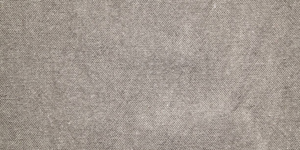 istock Brown cotton fabric texture background, Wrinkle surface textile, wallpaper, banner 2157236996