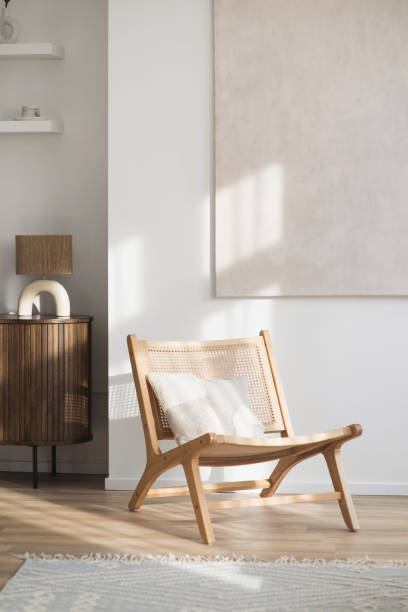 istock Interior design. Chair with vase in a living room 2157240466