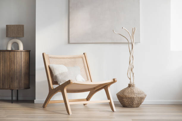 istock Interior design. Chair with vase in a living room 2157240467