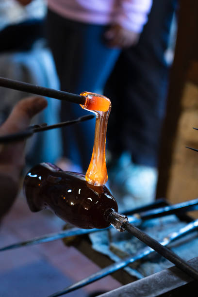 istock Jug in the process of creation with blown glass 2157245032