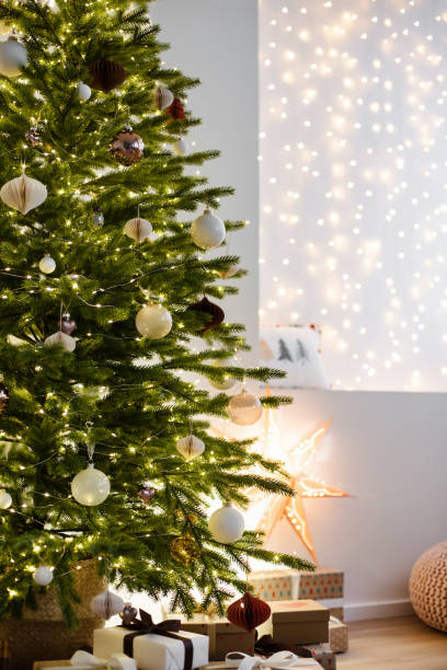 istock Interior design with Christmas tree with gifts and lights 2157250687