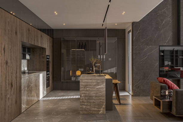 istock cozy open kitchen feature with wooden cabinets, gray backsplash, and marble island with sink. 2157251528